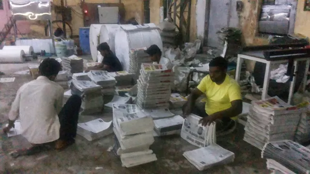 अंकांचे गठ्ठे बांधताना
