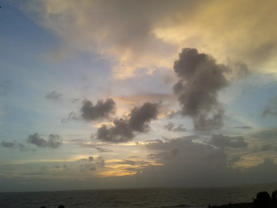Clouds gathering over the sea at sunset, seen from Bandstand in Bandra, Mumbai