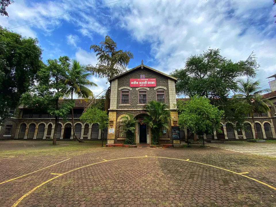 The stone building and empty courtyard of Navin Marathi Shala in Pune