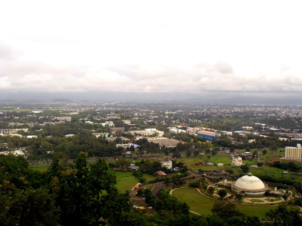 Nashik city seen from the Pandavleni hill, with the dome of the Buddha Smarak in the foreground